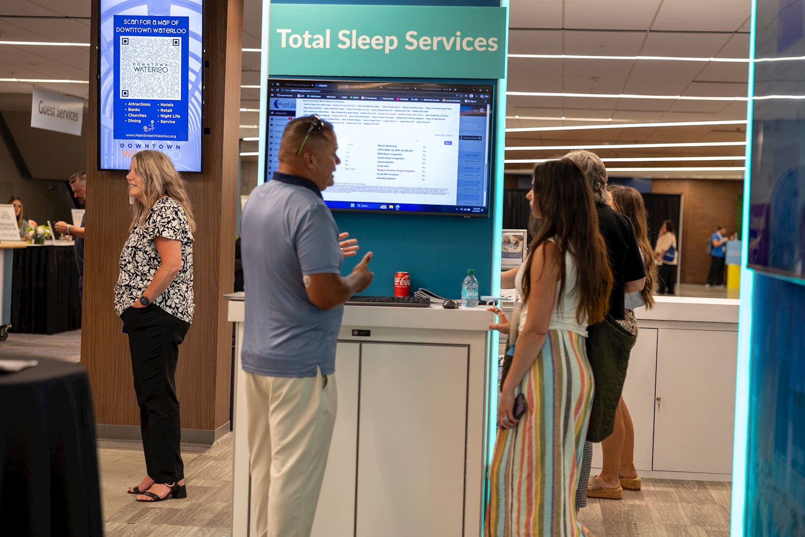 Members connecting with VGM experts at the Total Sleep Services display