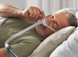 F&P Solo Pillow Person Sleeping